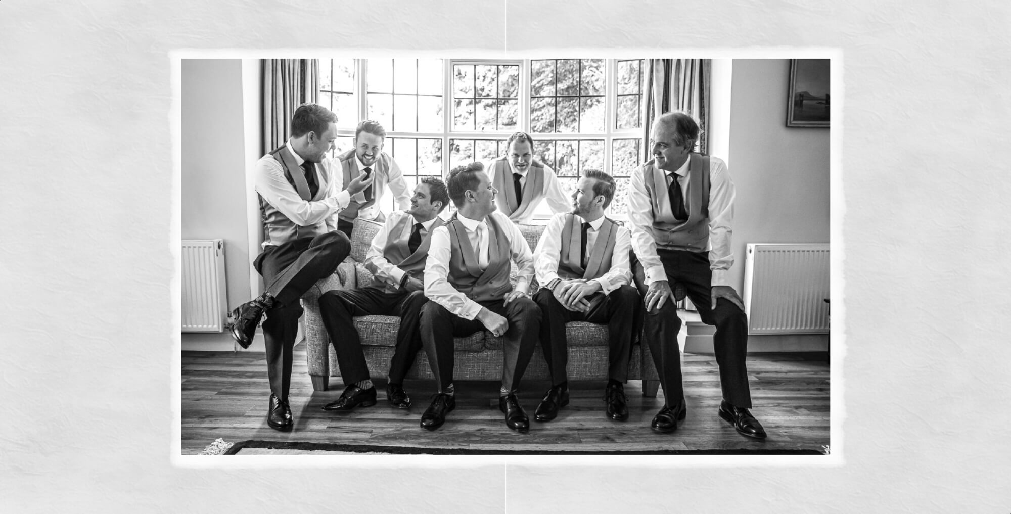 Wedding Photographer Warwickshire: Wedding album page design showing a natural groomsmen image