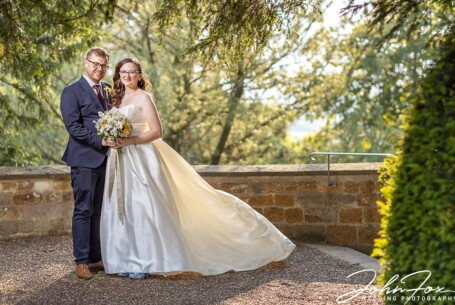 Bride and groom at Rockingham Castle by John Fox