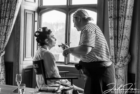 Nicole getting ready for her big day. Wedding Photography at Ashridge House Hertfordshire