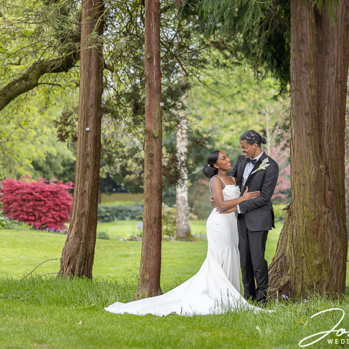 Bride and groom in the gardens at Edgbaston Park Hotel