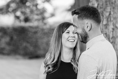 Black and white photo of the happy couple at Fawsley Hall, Northamptonshire
