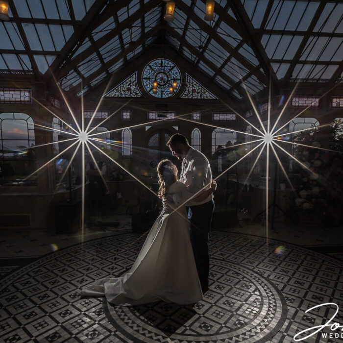 Cassie and Chris take to the dance floor at Kilworth House. Photo by John Fox Wedding Photography.