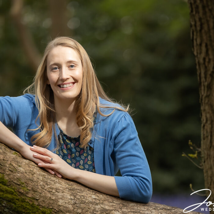 Bride-to-be, Sally, leaning on a tree in Loughborough.