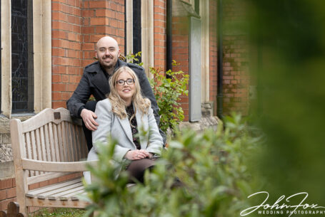 Calluna sitting on a bench with Samuel behind her. Photo by John Fox.