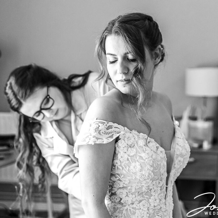 Emma getting ready for her wedding at The Barns at Hunsbury Hill, Northamptonshire