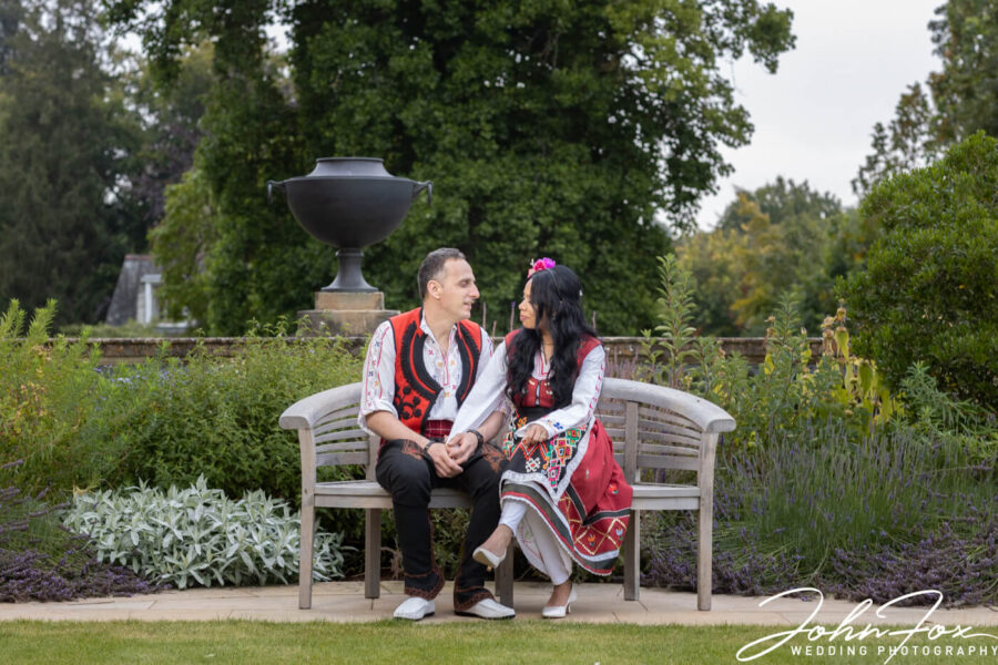 The bride and groom in traditional Belgian clothing.