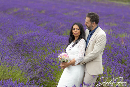 Bride and Groom in the fields of lavender.