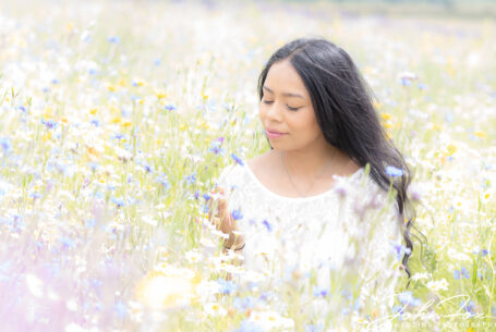 The bride amongst the wild flowers in Hertfordshire countryside.