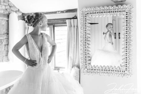 The bride in her wedding dress. Photo by John Fox Wedding Photography.