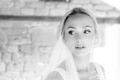Close up photo of the bride in her wedding dress at Crockwell Farm.