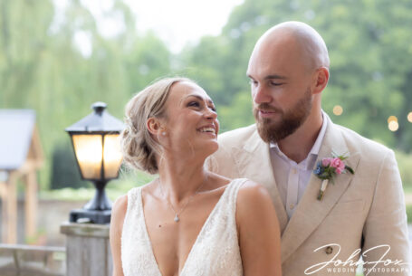 The newly wed couple sharing a moment at their Northamptonshire wedding