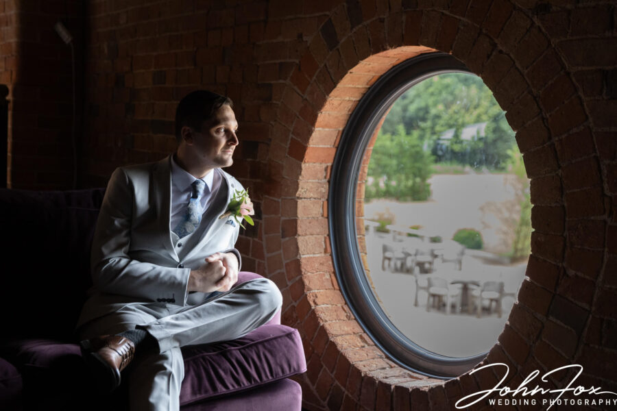 The groom awaiting his bride by John Fox Wedding Photography
