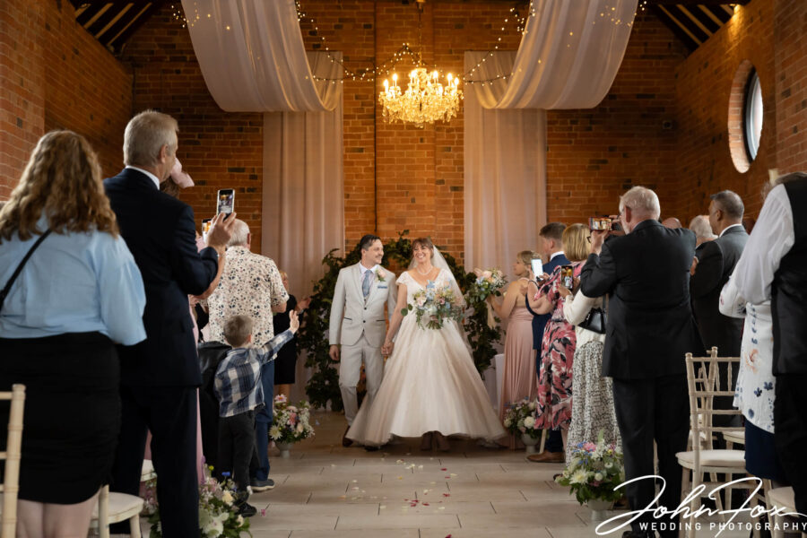 The happy couple after the wedding ceremony at Meadow Barn.