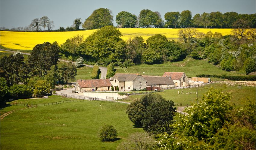 Wedding photographer at Kingscote Barn in Gloucestershire. Image of the scenic venue.