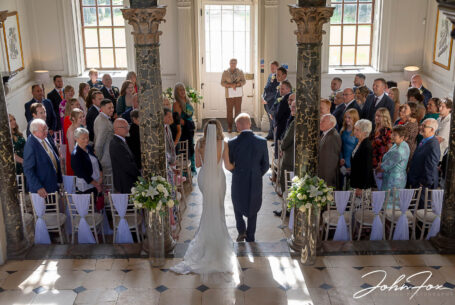 Photo by John Fox Wedding Photography of Lorna's father giving her away at the Wedding ceremony at Chicheley Hall, Buckinghamshire