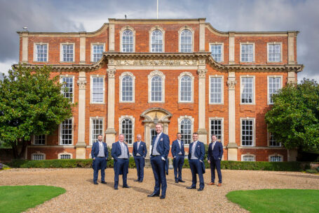 Groom and Groomsmen in front of Chicheley Hall