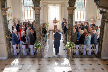 Bride walking up the aisle at Chicheley Hall