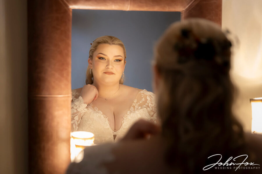 Bride portait in a mirror at Crockwell Farm Northamptonshire