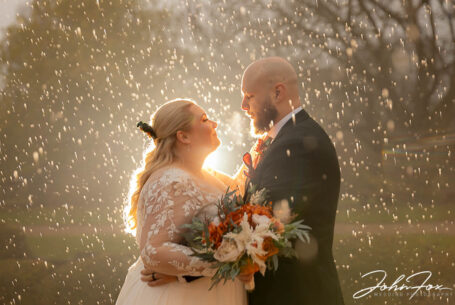 Bride and Groom rain shot at Crockwell Farm in Northamptonshire.
