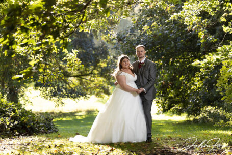 Bride and groom in the grounds and woodland at Magnolia Park on their special day
