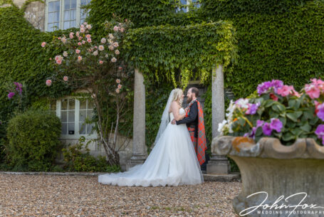 Bride and groom in the gardens and grounds at Winters Tale Country Barn