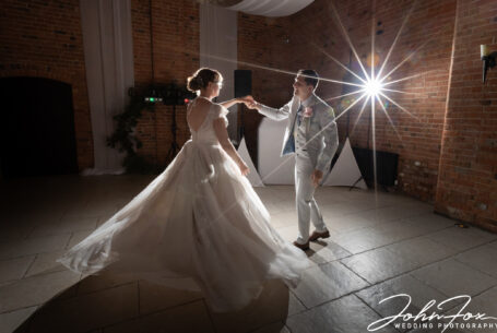John Fox Wedding Photography Coventry and Warwickshire. Bride and groom first dance in Meadow Barn at Stratford Park Hotel.
