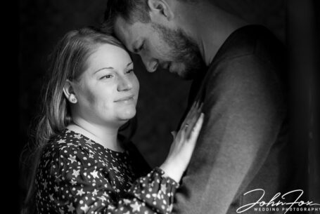 Black and white photo of the Bride and Groom to be on their pre-wedding shoot at Kilworth House Hotel in Leicestershire
