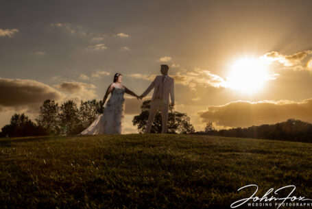 Bride and Groom in the grounds at Whittlebury Hall in Northamptonshire.