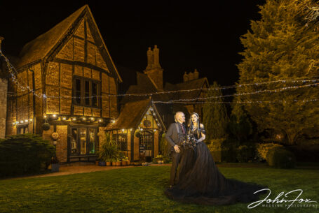Gothic Couples wedding photograph taken in front of Moreteyne Manor in Bedfordshire at night
