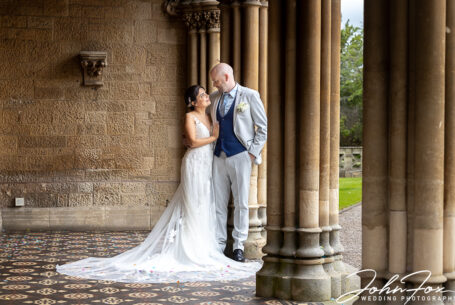 The newly-wedded couple outside a spectacular Victorian manor house in Cheltenham