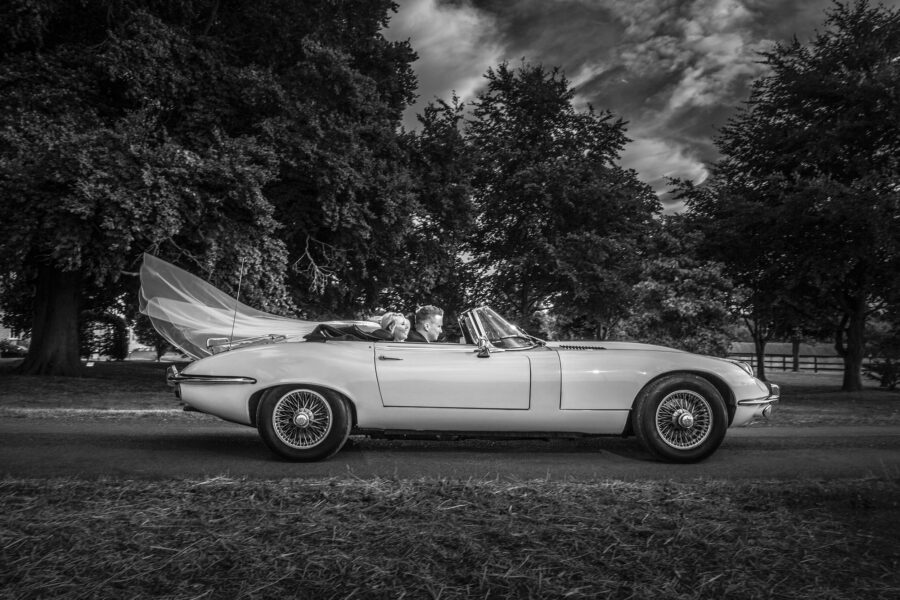 Congratulations on Your Engagement! Bride and groom in an E-type Jaguar