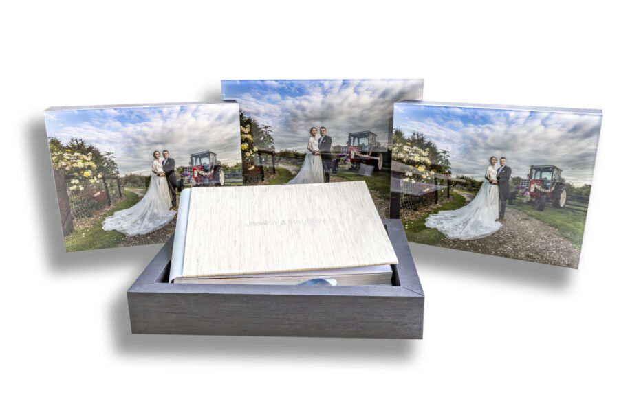 Wedding album with two smaller copies for parents.