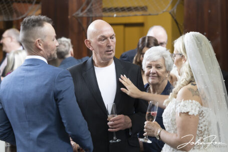 Guest congratulating the bride and groom at Coombe Abbey, Coventry.