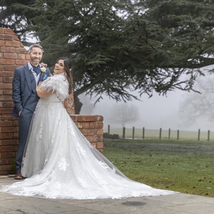 Bride and groom at Ashton lodge on a misty day by John Fox Wedding Photography