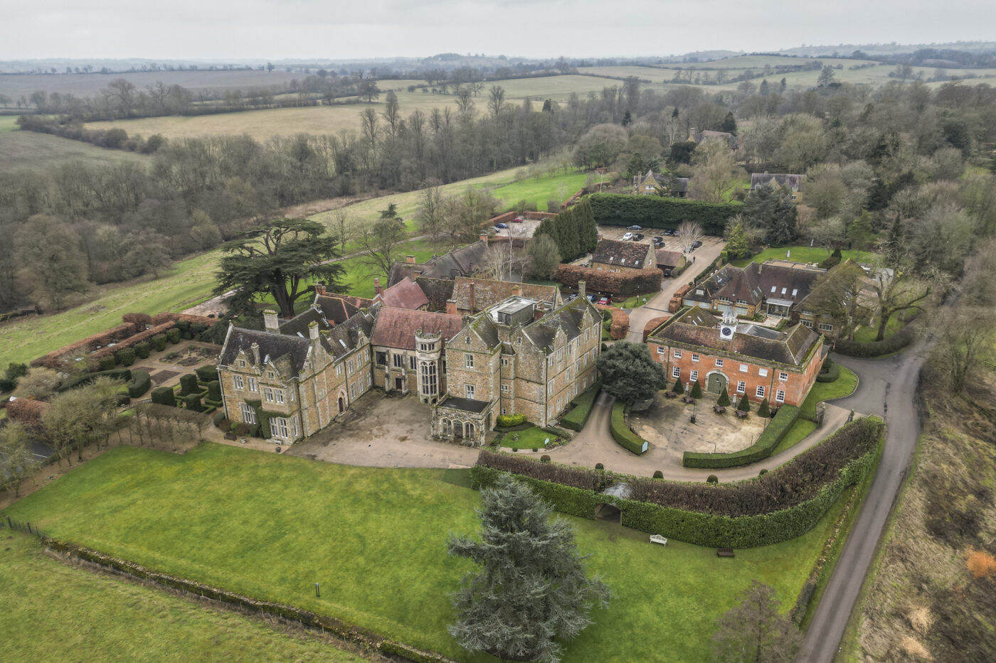 Valentine’s Weekend Wedding Photography at Fawsley Hall. Aerial photo of the Hall in Northamptonshire.
