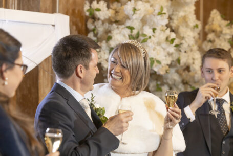 Valentine’s Weekend Wedding Photography at Fawsley Hall. Bride and groom during the speeches.