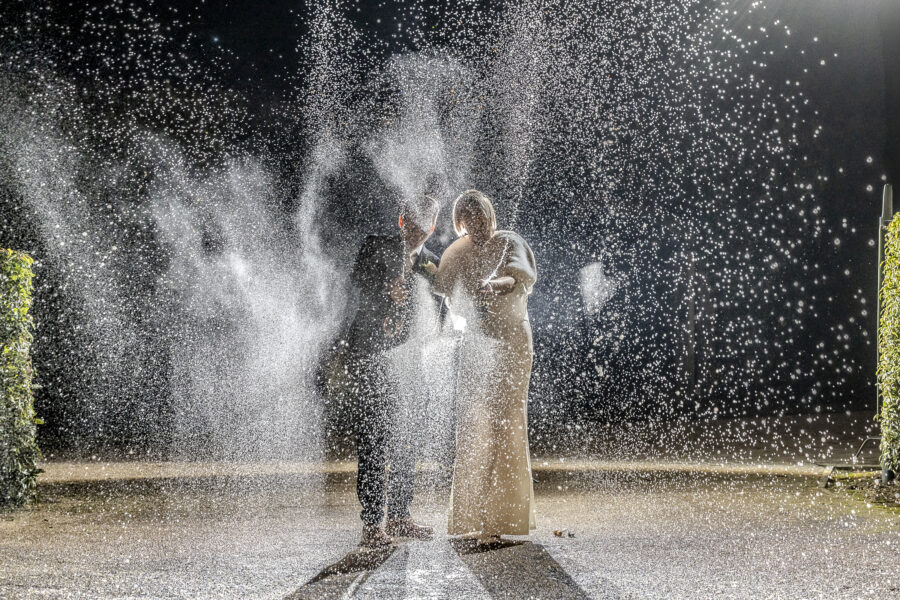 Champagne spray image taken at night at Fawsley Hall, Northamptonshire.