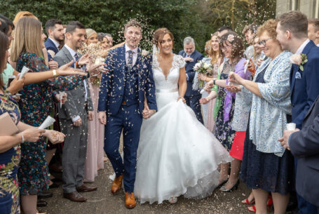 Wedding Confetti Photos. Groom covered in confetti.