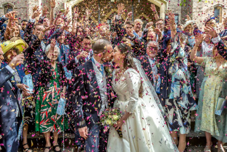 Wedding Confetti Photos. Guests are throwing at the same time.
