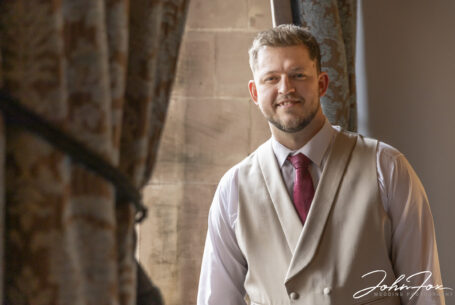 Weddings at Peckforton Castle. Portrait of the groom by John Fox Wedding Photography.
