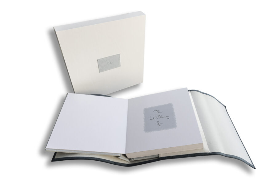 Manor by the Lake-Wedding Album. Image of the wedding album opened with the presentation box in the background.