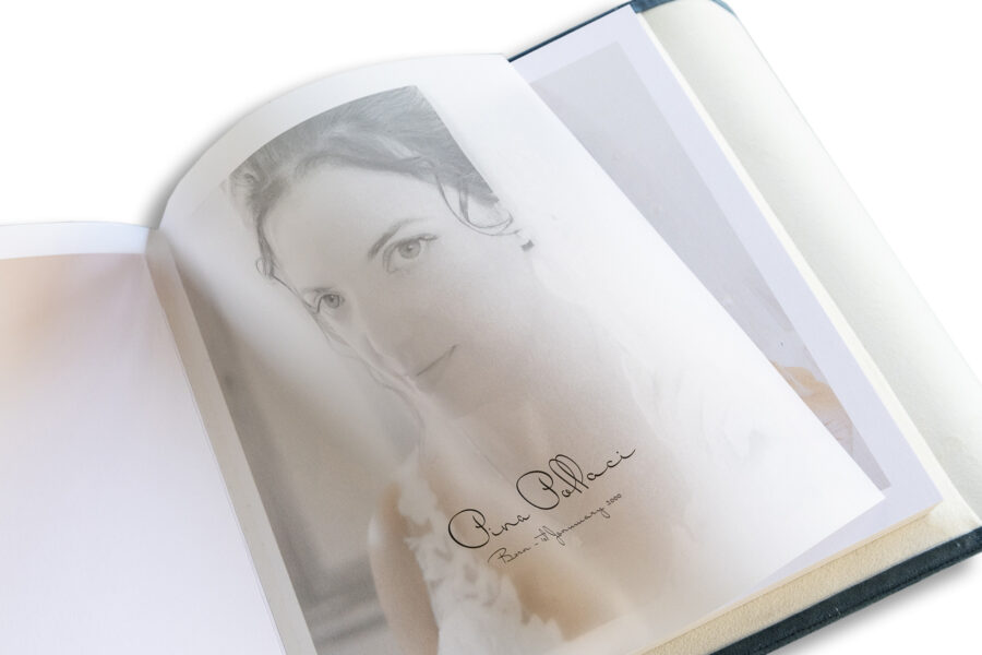 Manor by the Lake-Wedding Album showing the translucent printed page of the bride.