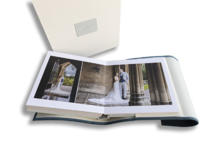 Manor by the Lake-Wedding Album showing the bride and groom at the entrance to the venue by John Fox Wedding Photography