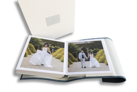 Manor by the Lake-Wedding Album showing the bride and groom in the gardens