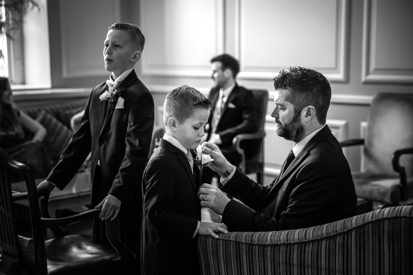 Wedding preparations in a documentary-style black and white image