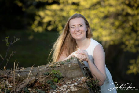 Bride to be on her pre wedding shoot with sunlight backlight through trees at Ansty Hall