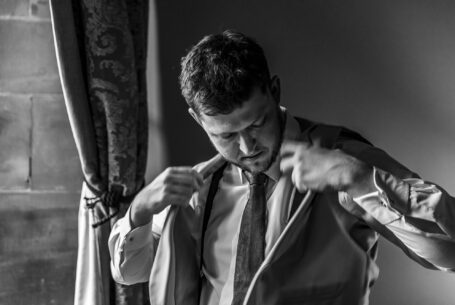 The groom prepares himself for the ceremony