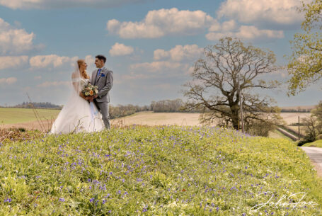Wedding photography Wiltshire, bride and groom in bluebells