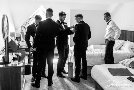 Groom and groomsmen getting ready for the ceremony in Coventry