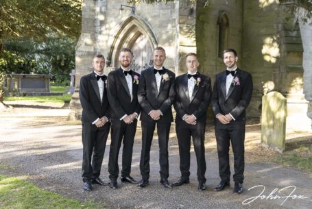 Groom and groomsmen at the church in Warwickshire